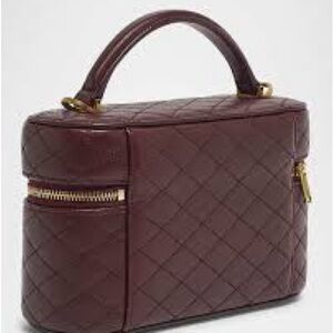 Burgundy Crossbody bag/purse for women and teen new with tags.